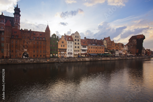 The free city of Gdansk's medieval center down by the Motlawa river at sunset 