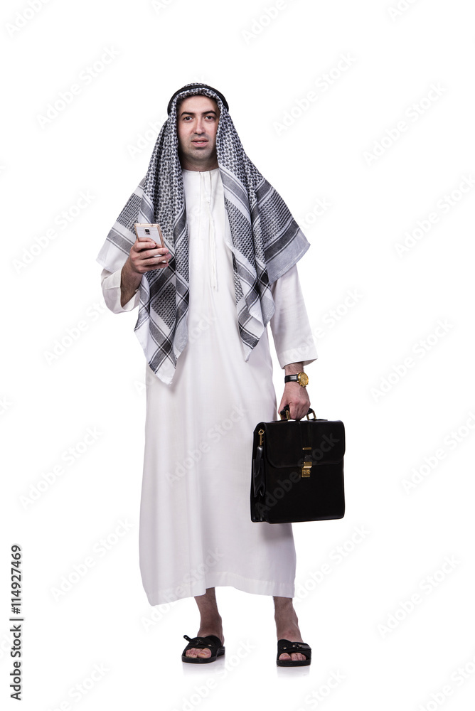 Arab man with his mobile phone isolated on white