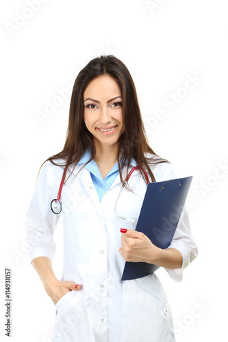 Portrait of young medical doctor with clipboard on a white backg