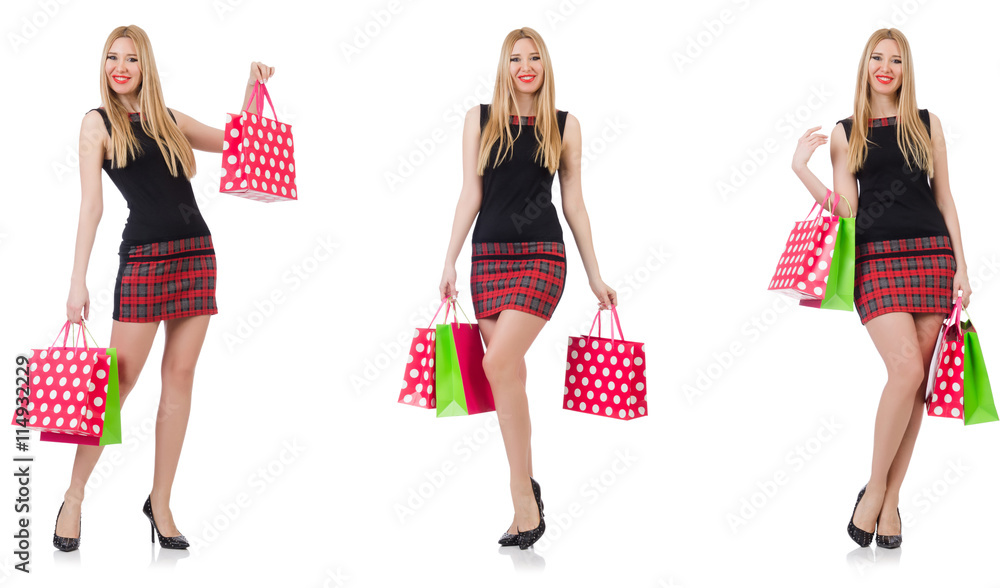 Woman with shopping bags isolated on white Woman with shopping bags isolated on white