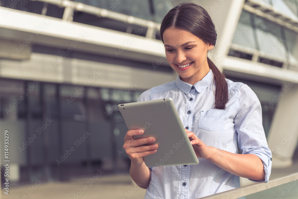 Beautiful business lady with gadget