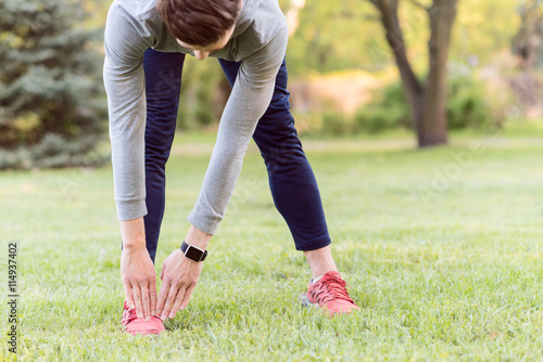 Healthy athlele exercising in park