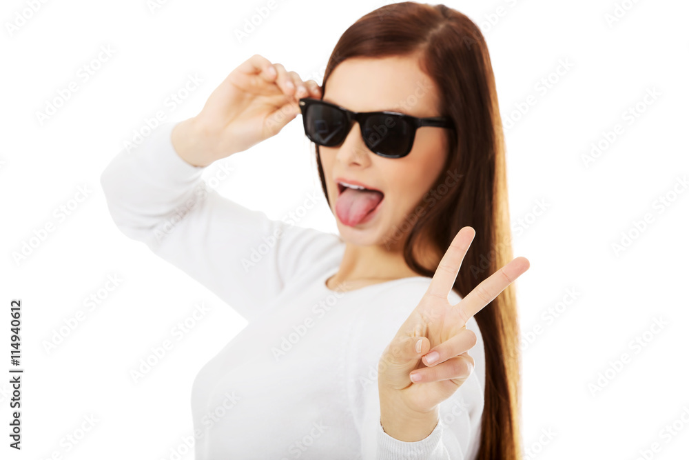 Happy brunette woman in sunglasses. Happy brunette woman in sunglasses.