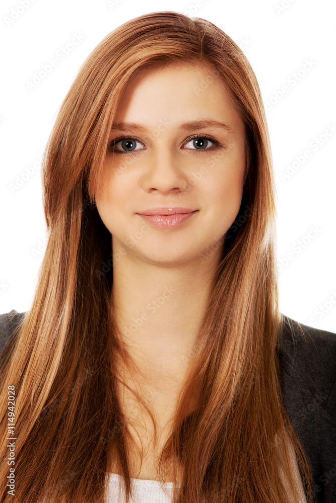 Pretty teenager girl smiling in cheerful mood Pretty teenager girl smiling in cheerful mood