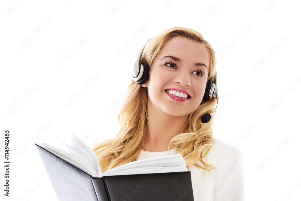 Closeup portrait of female customer service representative wearing headset. Closeup portrait of female customer service representative wearing headset.