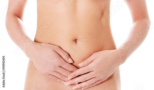 Body care, pregnancy diet concept, woman holding hands on the stomach.