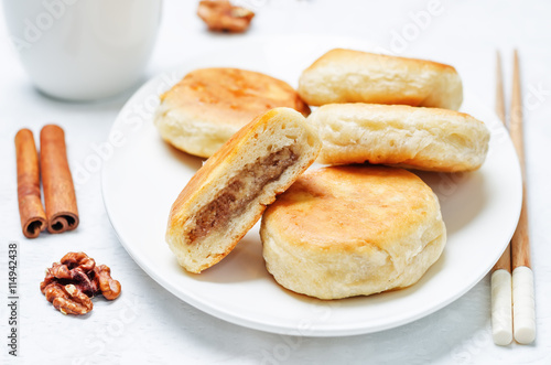 Korean sweet pancakes with nuts topping. Hotteok © nata_vkusidey