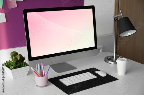 Stylish workplace with comp...