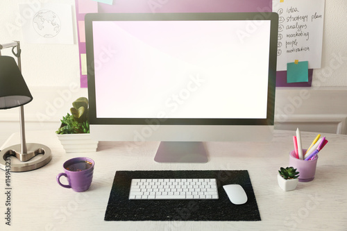 Stylish workplace with comp...
