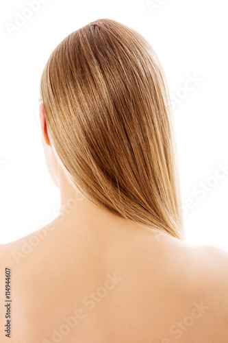 Blonde woman with healthy hair - isolated on white background.