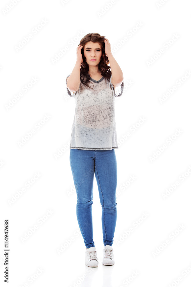 Young unhappy woman with long dark hair. Young unhappy woman with long dark hair.