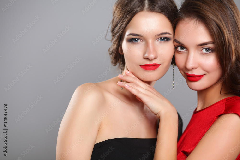 Two young beauty women standing together Two young beauty women standing together