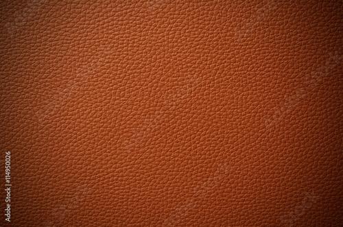 Brown leather skin background with vignette effect © tippapatt