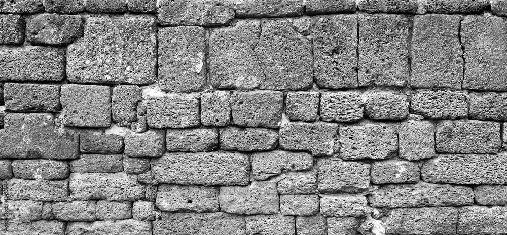 Fototapeta premium monochrome shot of stone wall texture background