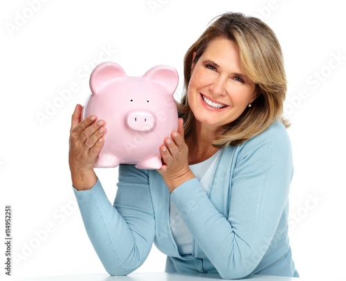 Business woman with a piggy bank.