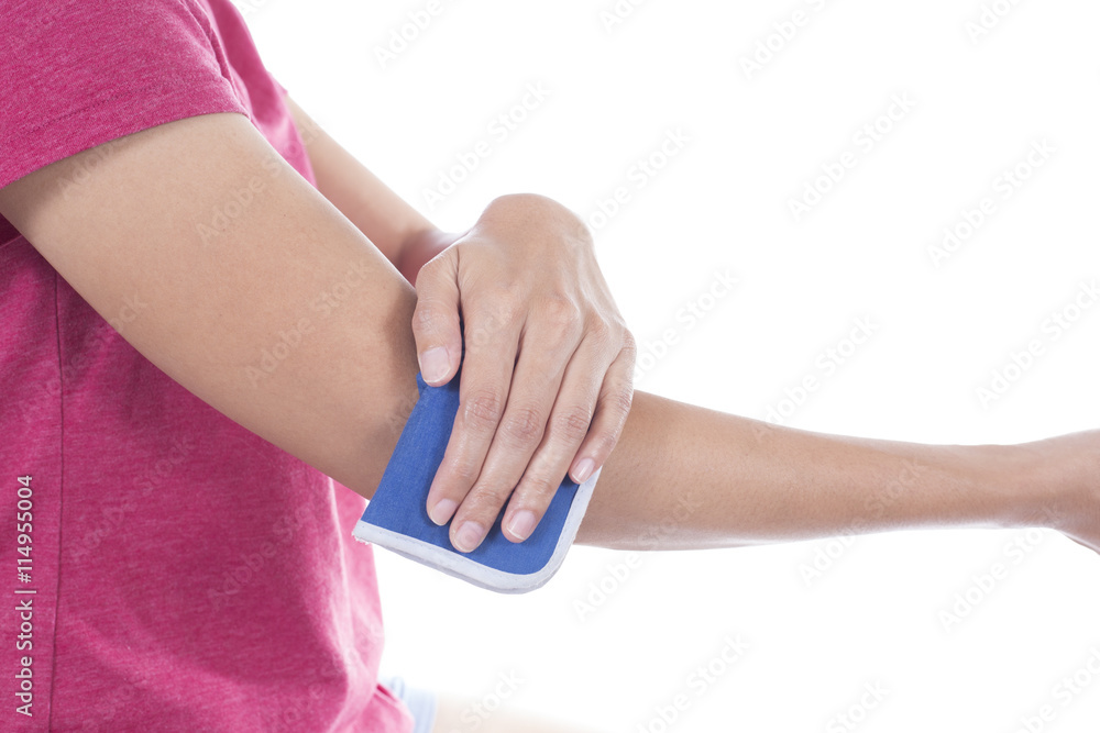 woman putting an ice pack on her elbow pain on white background