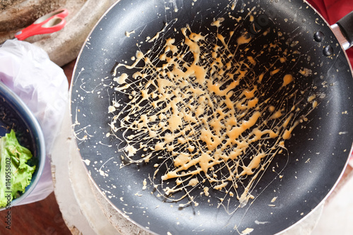 cooking egg net for wrapped food in pan photo