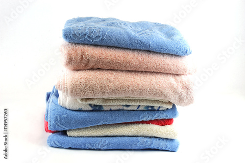 stacking bath towels isolated on white background