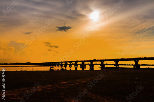 bridge sunset silhouette. © releon8211