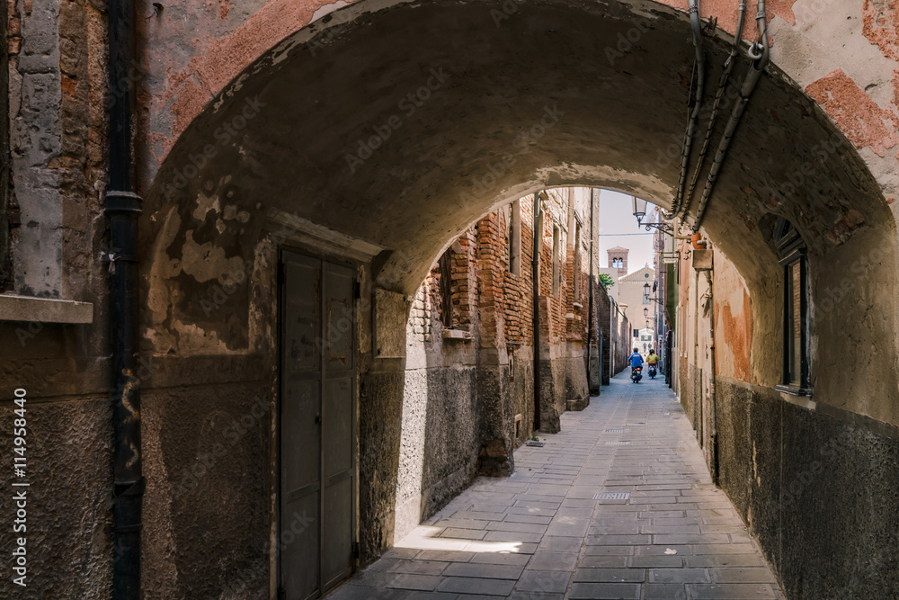 Arched street in the town of Chioggia, Italy