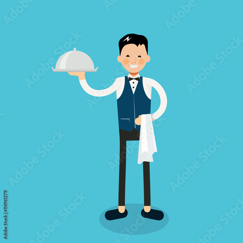 Young cheerful waiter stands with dish and napkin on hand