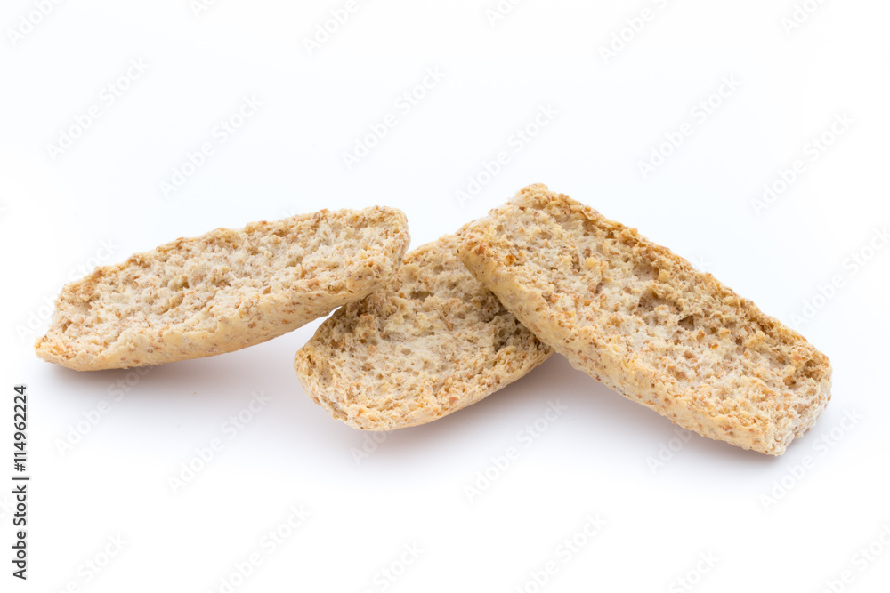 Dry flat bread crisps with herbs on a white background. Dry flat bread crisps with herbs on a white background.