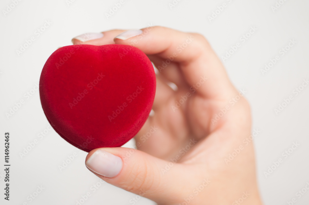 Fototapeta premium gift box with a ring in hand