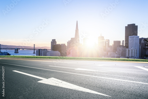 empty road with cityscape and skyline of san francisco in sunny