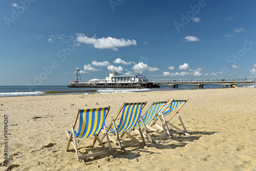 фотографія Deckchairs on seafront at Bournemouth, Dorset