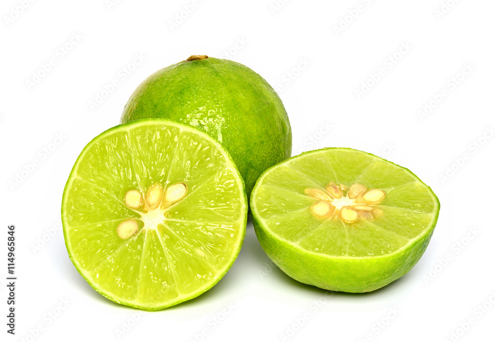 Limes with slices on white background Limes with slices on white background