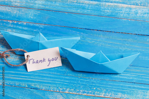 Label with the Words Thank you. Paper Boat with a sign