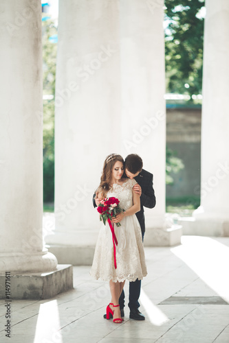 Luxury married wedding couple, bride and groom posing in old city