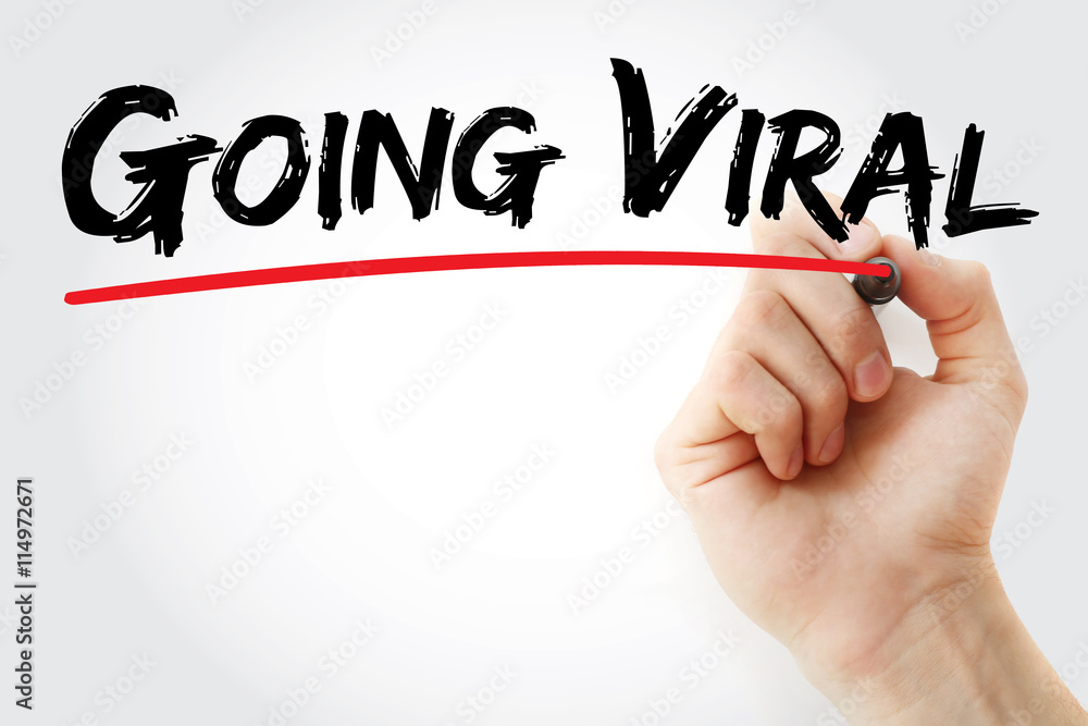 Hand writing Going Viral with marker, concept background Hand writing Going Viral with marker, concept background