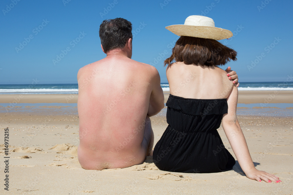 Women Looking At Naked Men On Beach