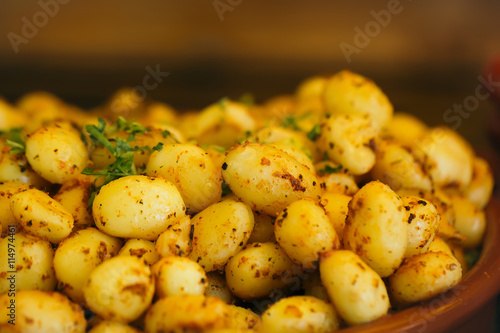Cooked potatoes served with parsley