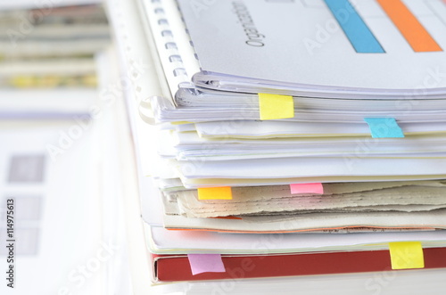 stack of books and documents with high key tone,business concept.