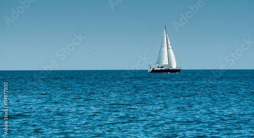 A view of the sailing boat near the Algarve coast in Portugal, 2016