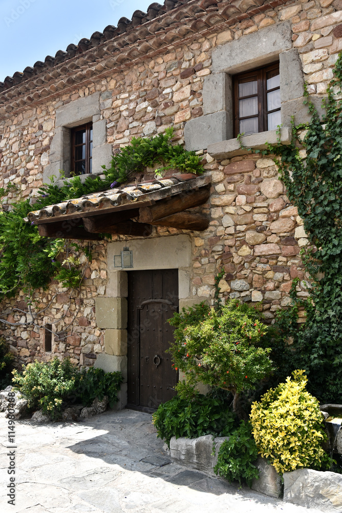 Tipical stone facade of a mediterranean house