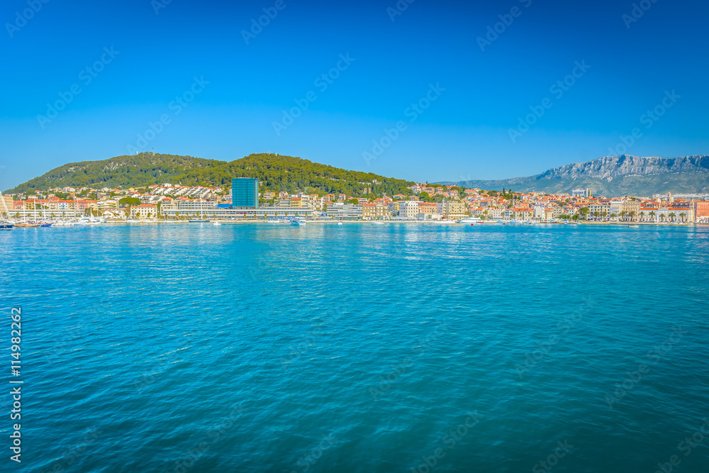 View at city of Split in summer time. / Waterfront view at coastline of city Split in summer time during touristic season, Croatia Europe.