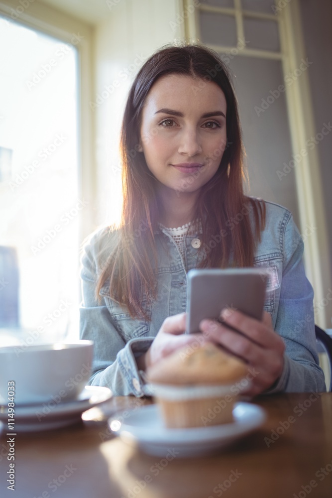 Portrait of beautiful woman with coffee at cafeteria Portrait of beautiful woman with coffee at cafeteria