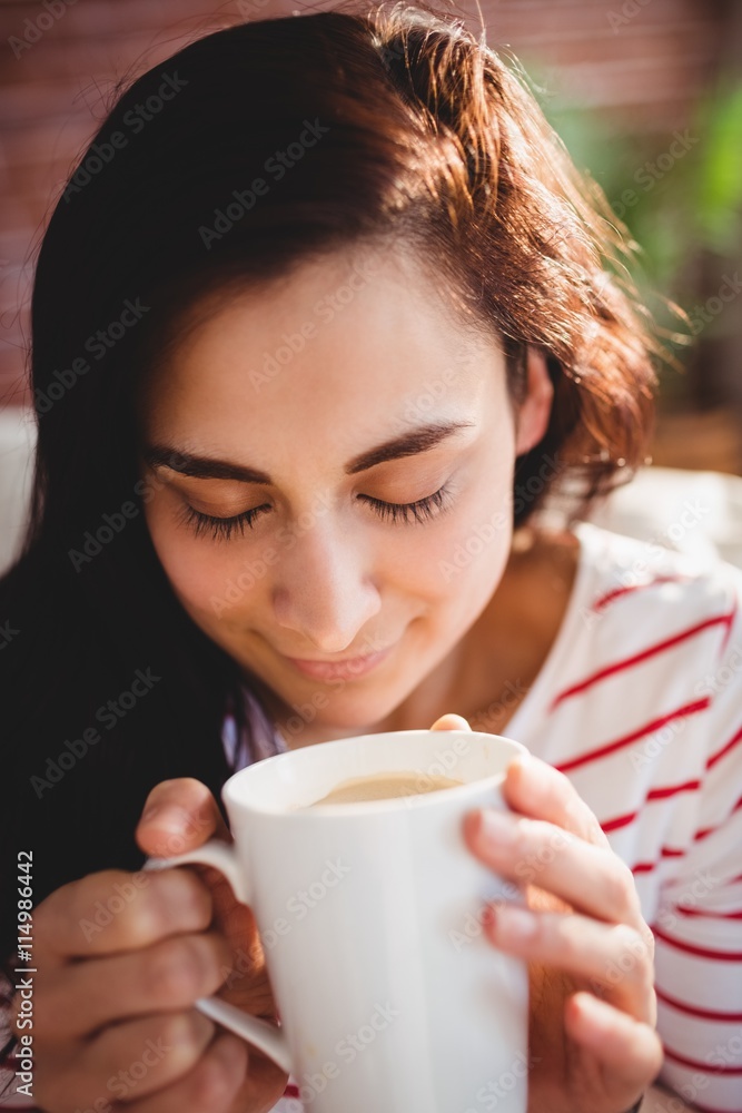Beautiful woman holding coffee cup Beautiful woman holding coffee cup
