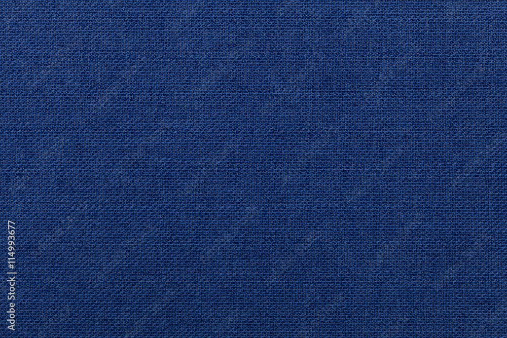 Dark blue background from textile material. Fabric with natural texture. Dark blue background from textile material. Fabric with natural texture.