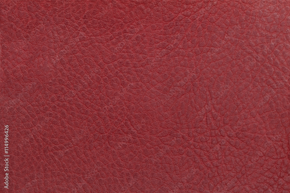 Bright red leather texture background. Closeup photo. Bright red leather texture background. Closeup photo.