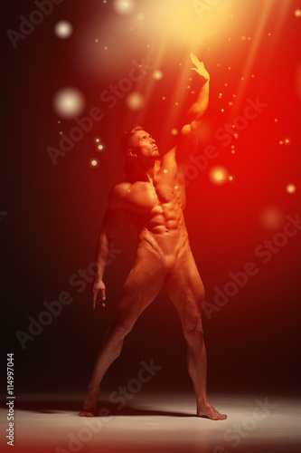 One young naked handsome man with sexy strong muscular body 