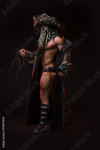 Принти на полотні Man with sexy strong muscular body dressed in costume monster