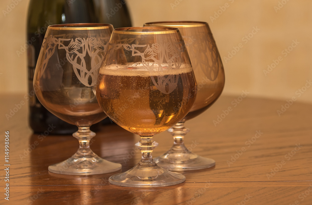 glass of champagne on a table glass of champagne on a table