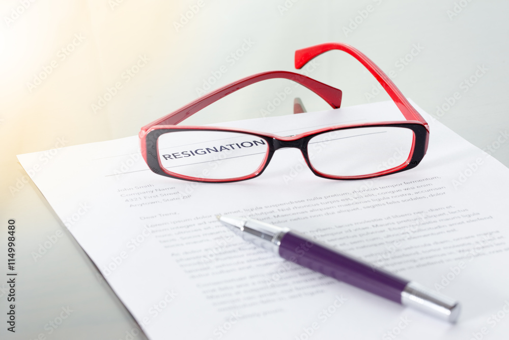 Resignation letter information with pen and glasses. Resignation letter information with pen and glasses.