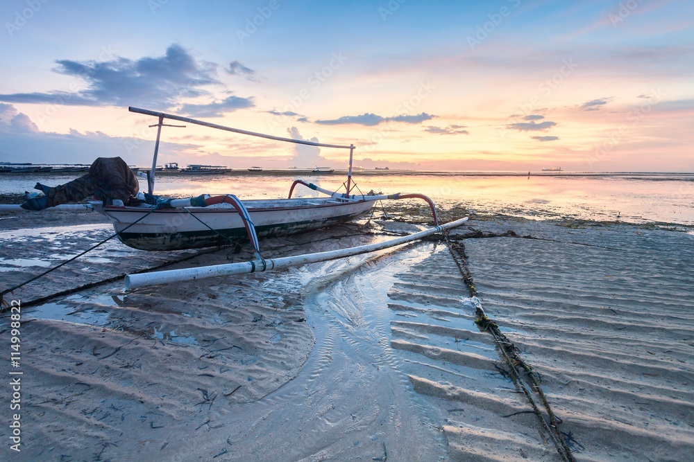 Holiday in Bali, Indonesia - Reflection Sunrise in Tanjong Benoa with boat Holiday in Bali, Indonesia - Reflection Sunrise in Tanjong Benoa with boat