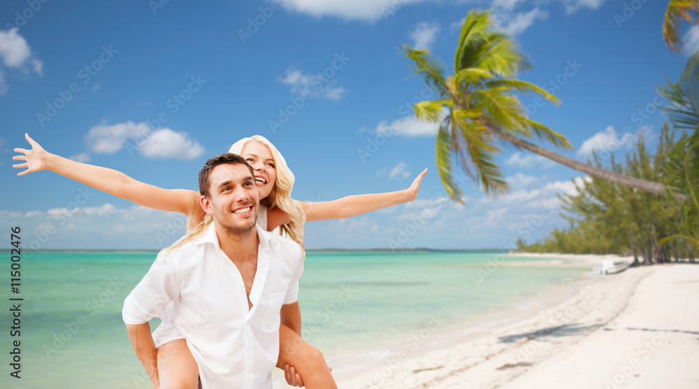 happy couple having fun over summer beach happy couple having fun over summer beach