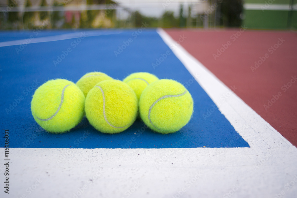 five tennis balls